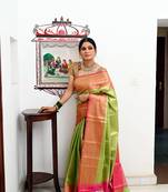 Green woven Faux kanchipuram silk saree with blouse