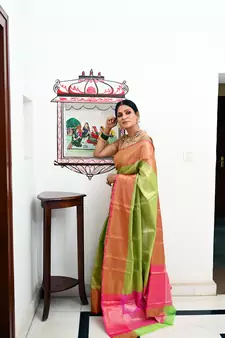 Green woven Faux kanchipuram silk saree with blouse