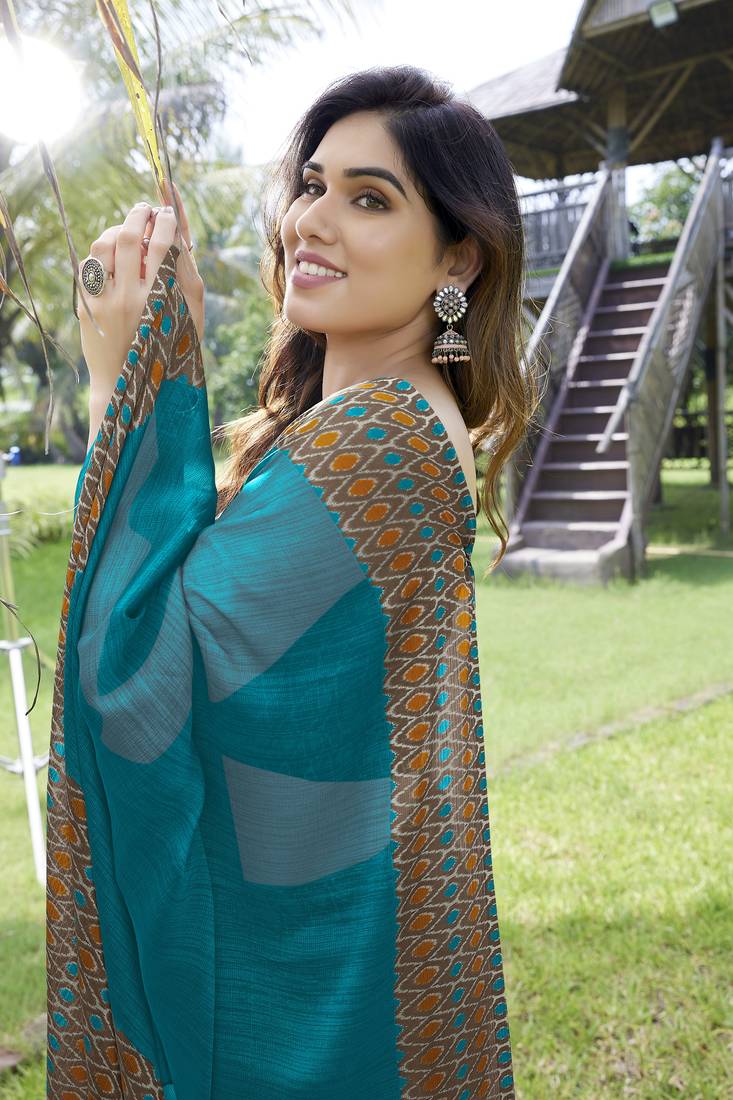 Turquoise plain chiffon saree with blouse