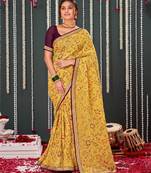 Light Mustard Crushed Brasso Saree With Foil Print And Zari Border