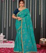 Teal Blue Crushed Brasso Saree With Foil Print And Zari Border
