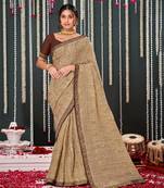 Beige Crushed Brasso Saree With Foil Print And Zari Border