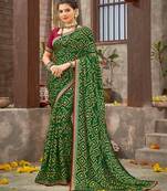 Dark Green Brasso Saree With Foil Print And Zari Border