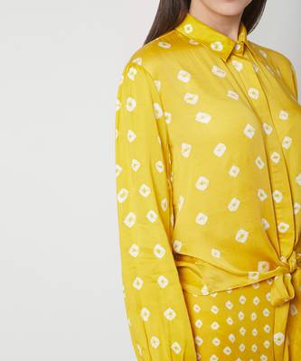 Yellow bhandhej collared shirt with a knot and bhandhej pants 3