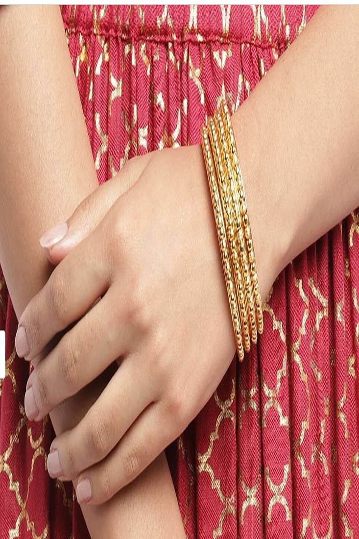 GOLD PLATED SET OF 4PC BALL BANGLE..