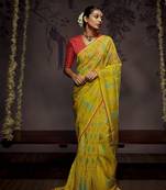 Yellow woven organza saree with blouse
