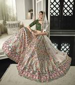 WHITE & GREEN THREAD AND SEQUINS EMBROIDERED GEORGETTE FESTIVE & PARTY WEAR SEMI STITCHED LEHENGA