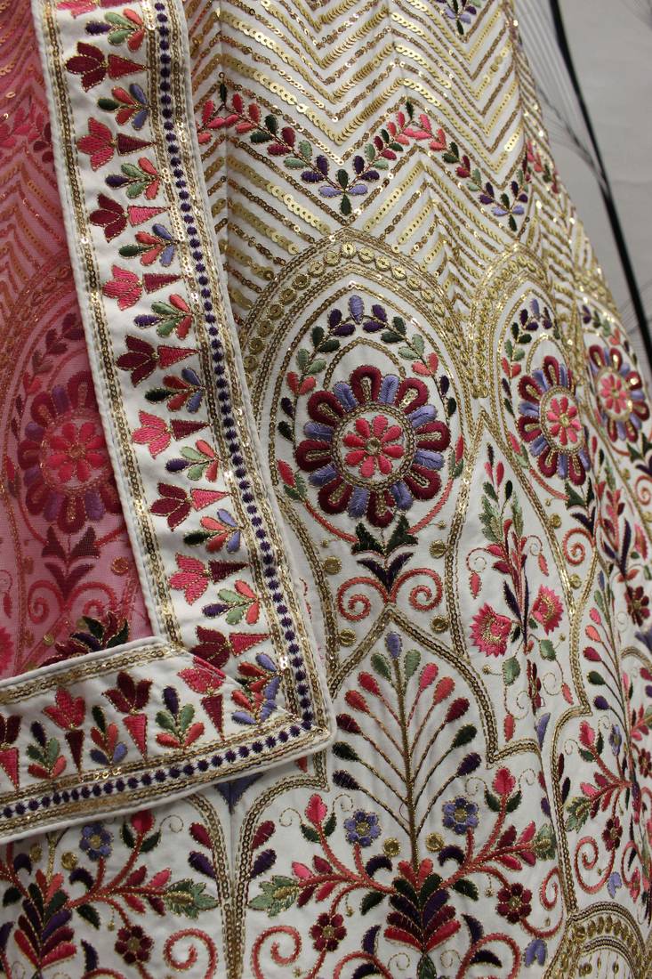 WHITE & DEEP PINK THREAD AND SEQUINS EMBROIDERED GEORGETTE FESTIVE & PARTY WEAR SEMI STITCHED LEHENGA