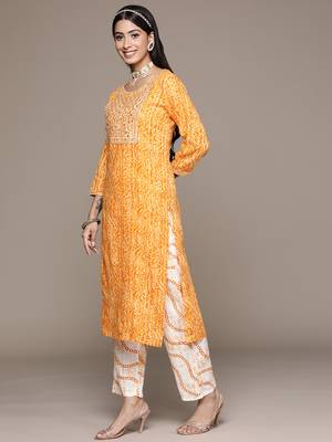 Yellow embroidered cotton kurta sets 2