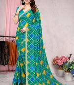 Turquoise printed georgette saree with blouse