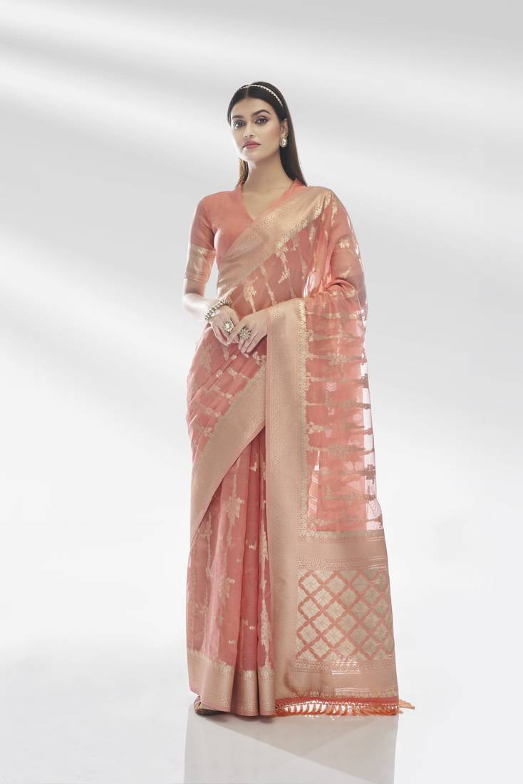 Pink woven organza saree with blouse