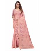 Peach woven organza saree with blouse