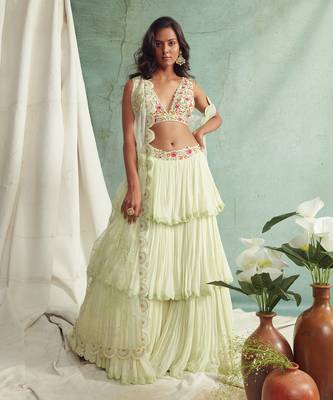 Mint Green Frilled Lehenga Blouse And Cape 1