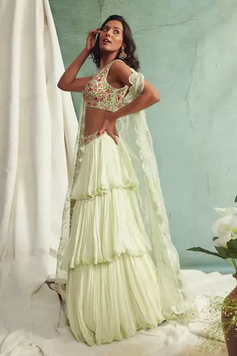 Mint Green Frilled Lehenga Blouse And Cape