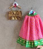 Printed Pink And Green Ghaghra With Gold Bow Top