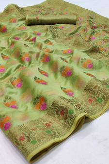 Green woven organza saree with blouse