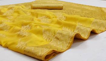 Yellow woven organza saree with blouse 1