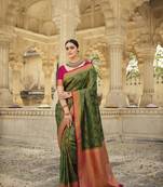 Dark green woven silk saree with blouse