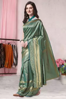 Teal woven banarasi saree with blouse