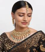Kundan Neckpiece with Earrings and Maang Tikka