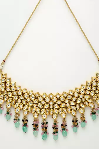 Kundan Neckpiece with Earrings and Maang Tikka