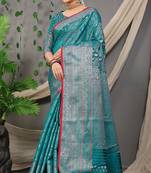 Dark green woven pure silk saree with blouse