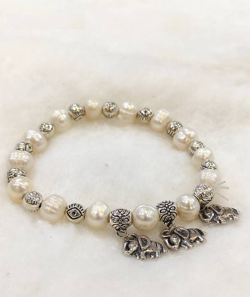 White mother of pearl bracelets
