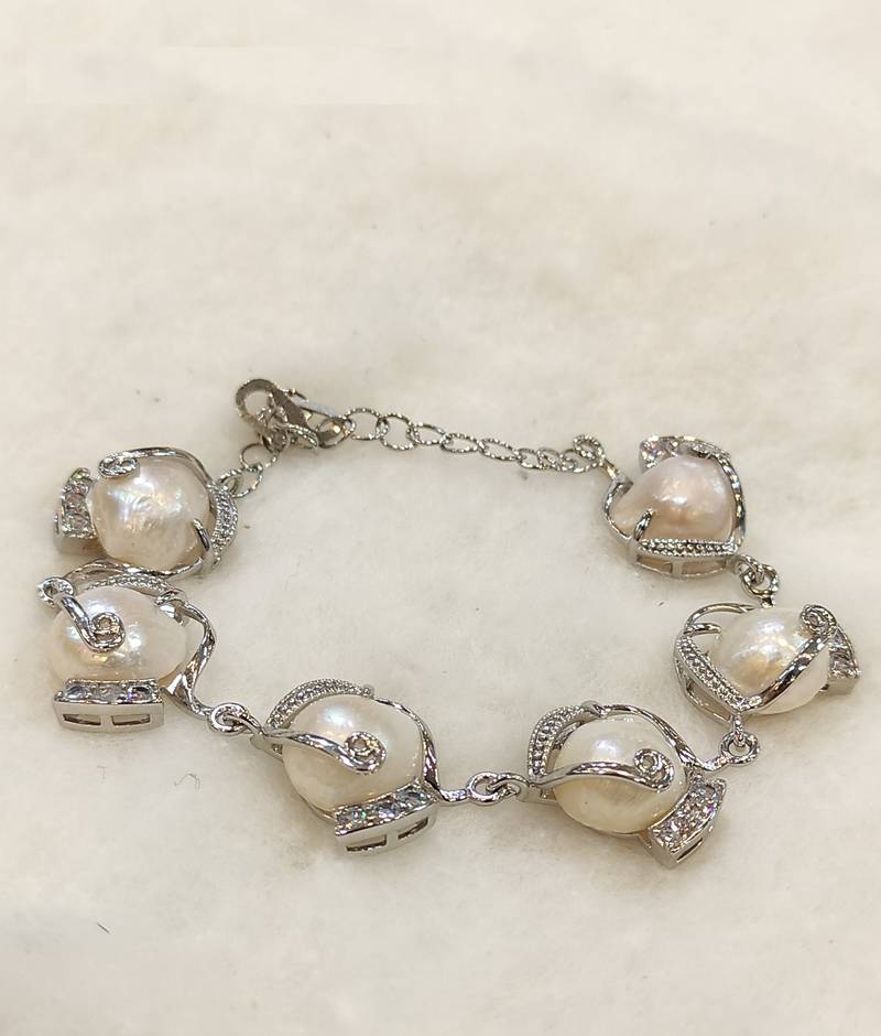 White mother of pearl bracelets