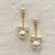 White pearl earrings