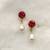 White pearl earrings