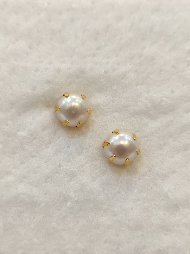 White pearl earrings