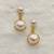 White pearl earrings