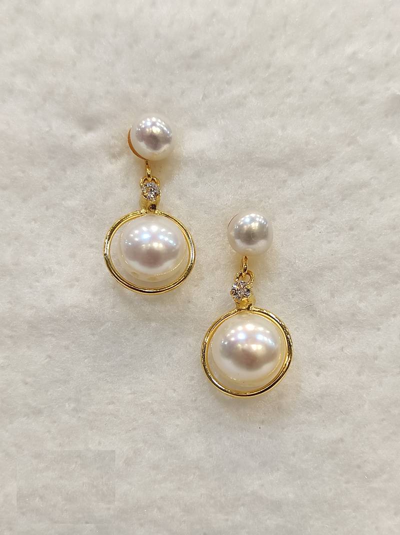 White pearl earrings