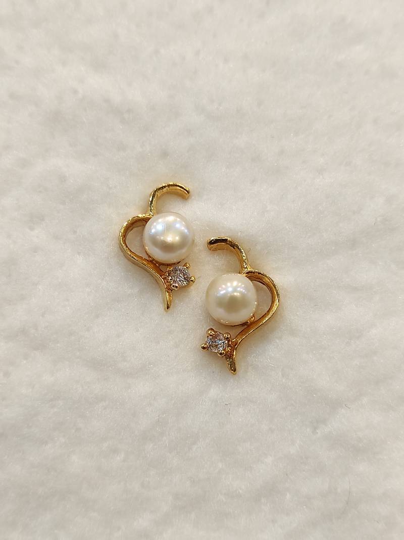 White pearl earrings