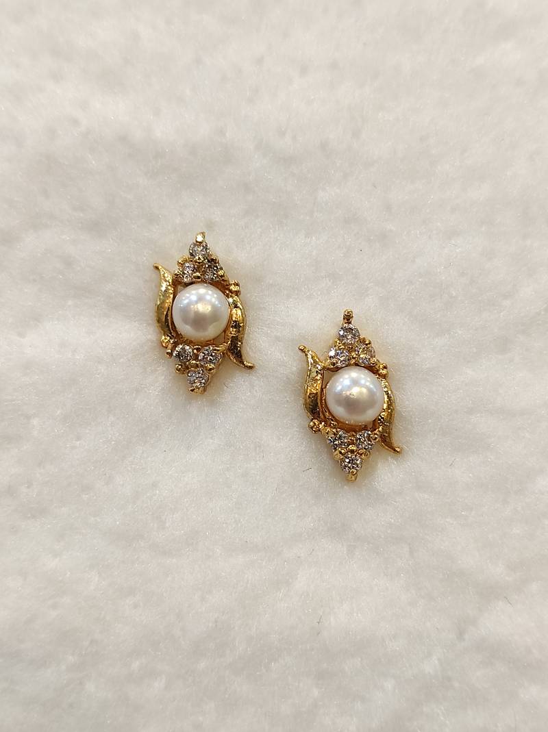 White pearl earrings