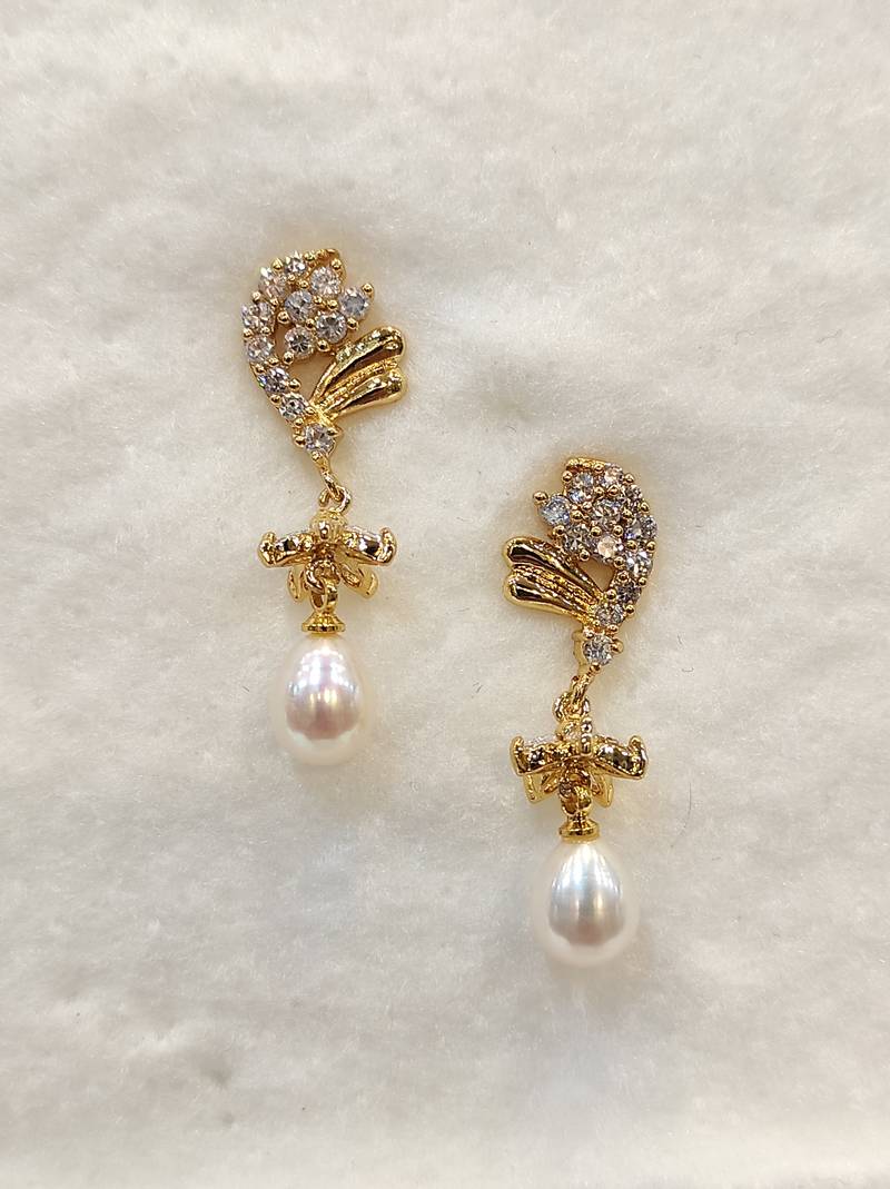 White pearl earrings