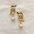 White pearl earrings