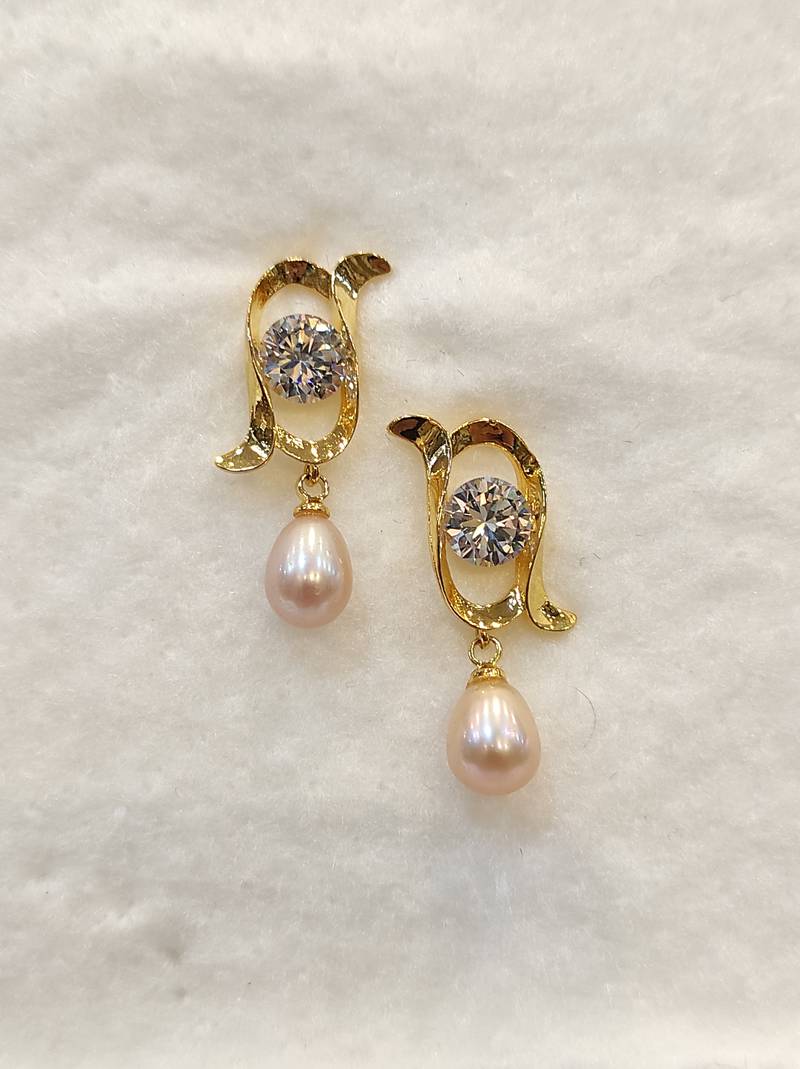 White pearl earrings