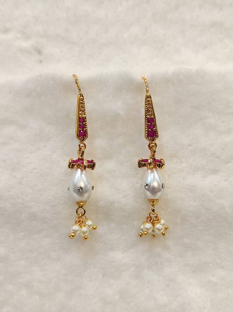 White pearl earrings