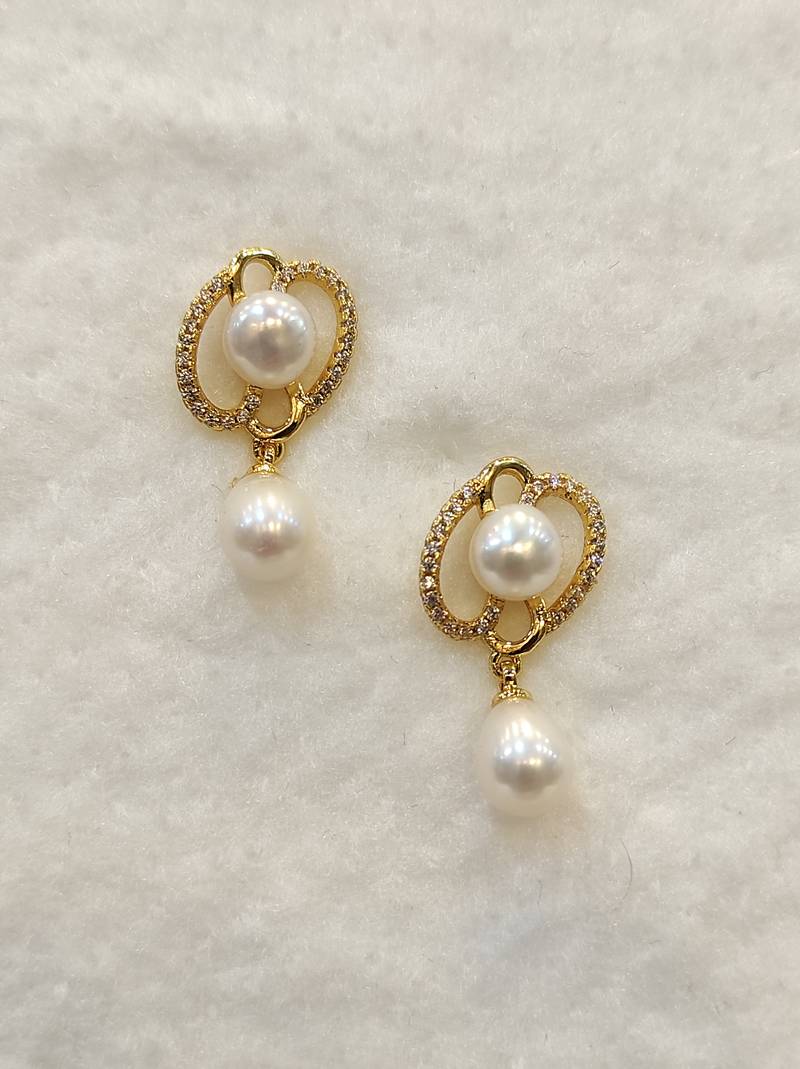 White pearl earrings