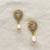 White pearl earrings