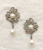 White pearl earrings