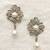 White pearl earrings