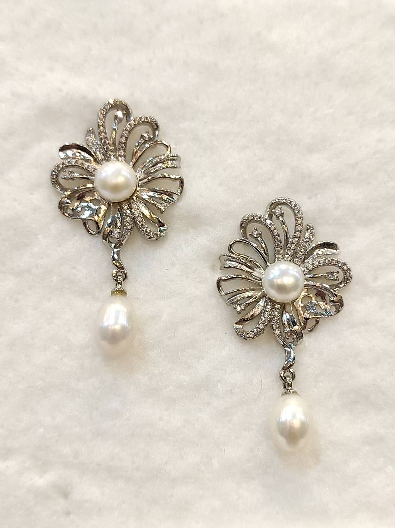 White pearl earrings
