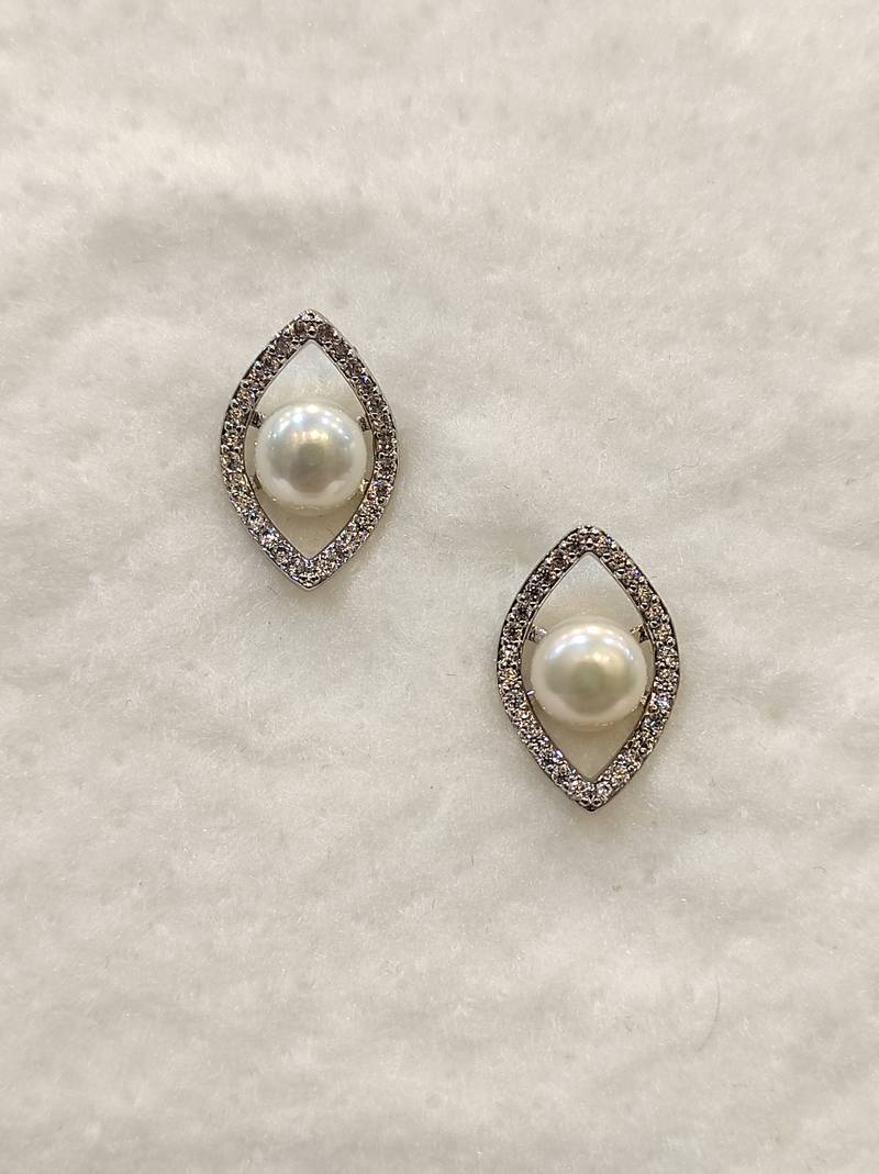 White pearl earrings
