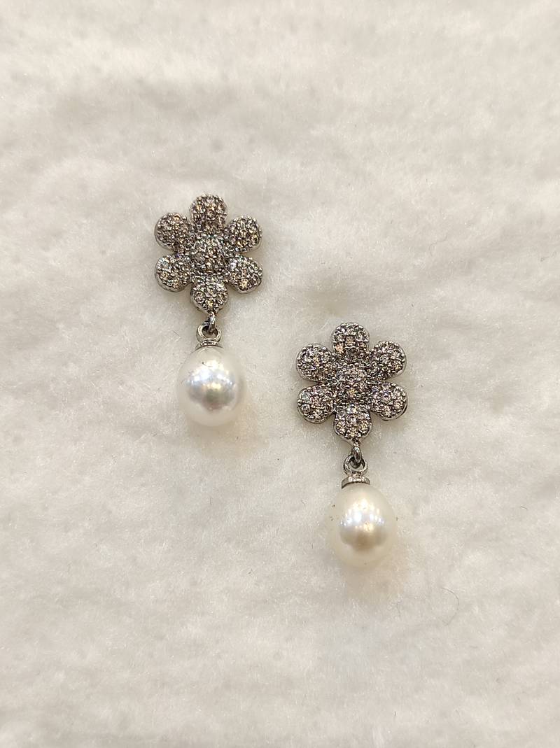 White pearl earrings