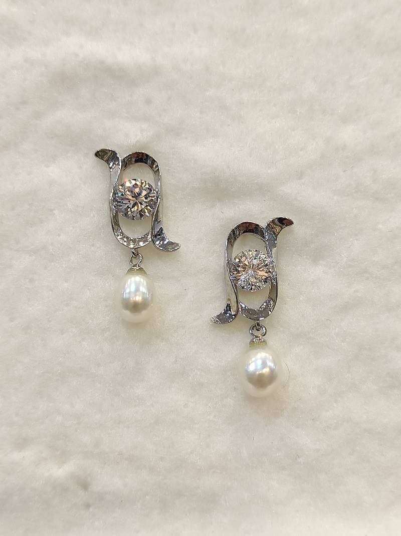 White pearl earrings