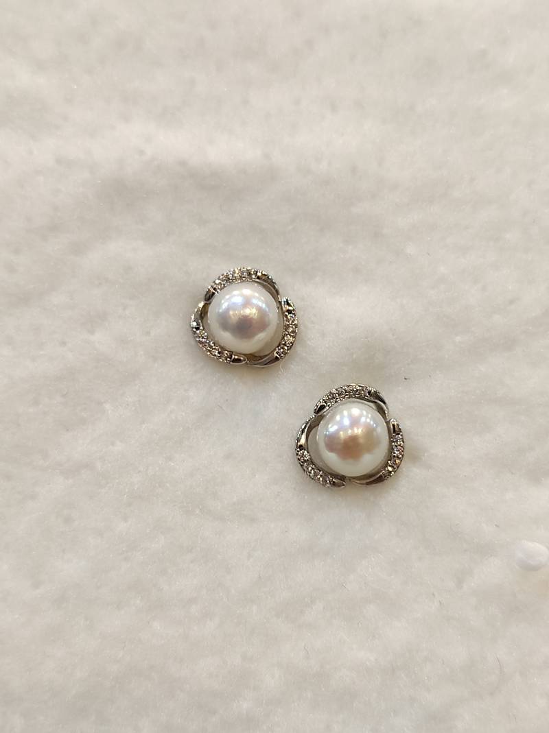 White pearl earrings
