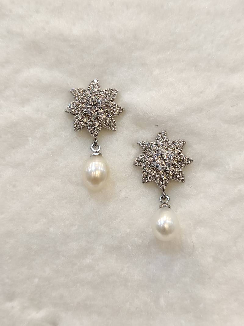 White pearl earrings