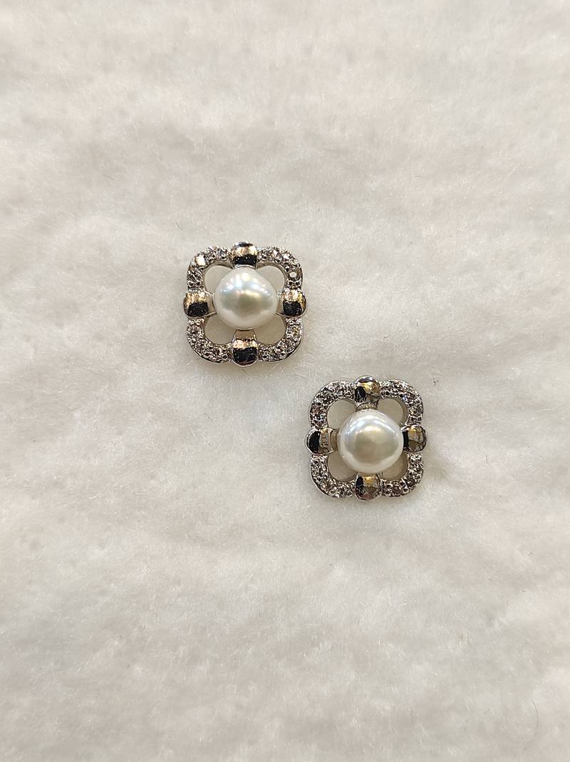 White pearl earrings